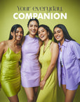 Four women posing together with a green background and text 'Your everyday, COMPANION'.
